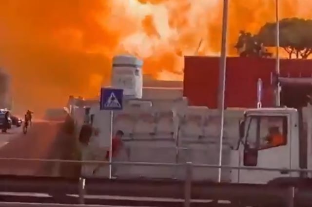 A still image from one of the videos of the Rome gas station explosion shared on social media.