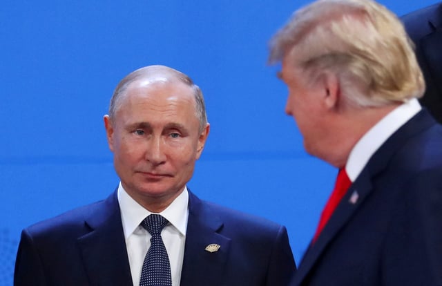 U.S. President Donald Trump and Russia's President Vladimir Putin are seen during the G20 leaders summit in Buenos Aires, Argentina November 30, 2018. REUTERS/Marcos Brindicci/File Photo