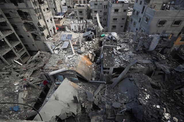 A view of the site of Thursday's Israeli strike that damaged and destroyed residential buildings, at Shati (Beach) refugee camp, in Gaza City, July 4, 2025. REUTERS/Mahmoud Issa
