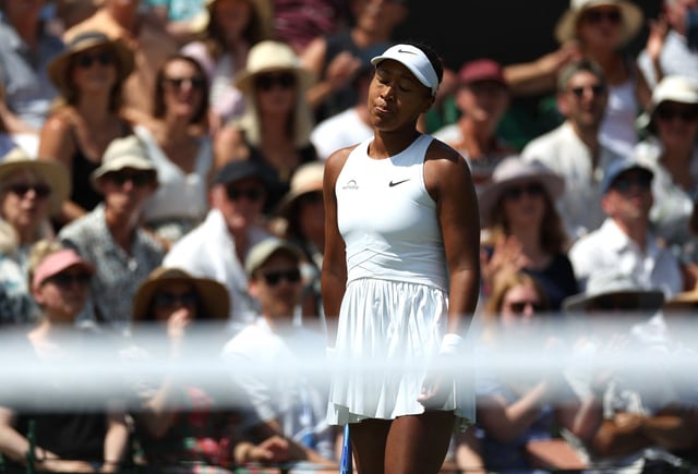Tennis - Wimbledon - All England Lawn Tennis and Croquet Club, London, Britain - July 4, 2025 Japan's Naomi Osaka reacts during her third round match against Russia's Anastasia Pavlyuchenkova REUTERS/Isabel Infantes