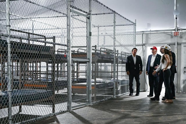 President President Donald Trump, Florida Governor Ron DeSantis, and Secretary of Homeland Security Kristi Noem (R) tour a migrant detention center, dubbed “Alligator Alcatraz,” located at the site of the Dade-Collier Training and Transition Airport in Ochopee, Florida, on July 1, 2025. (Andrew Caballero-Reynolds/AFP/GETTY IMAGES NORTH AMERICA/TNS)