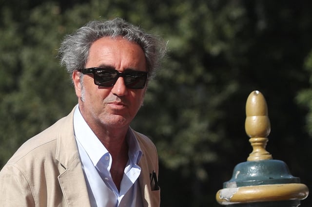 Director Paolo Sorrentino arrives on the day of the eve of the opening of the 78th Venice International Film Festival, in Venice, Italy, August 31, 2021. REUTERS/Yara Nardi/File Photo