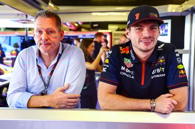 Max Verstappen of the Netherlands and Oracle Red Bull Racing and Jos Verstappen look on in the garage during practice ahead of the F1 Grand Prix of Abu Dhabi at Yas Marina Circuit on November 24, 2023 in Abu Dhabi, United Arab Emirates.