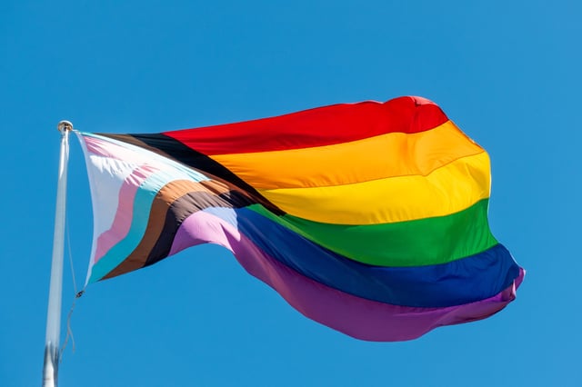 A photo showing a large Progress Pride Flag flies on a flagpole in Taylor Square, Oxford Street, Darlinghurst, Sydney. An Indianapolis church has defended a sermon that called for the death of LGBTQ+ people.