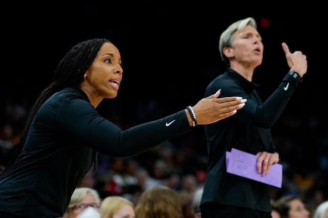 Phoenix Mercury assistant coach Nikki Blue (front) and head coach Vanessa Nygaard talk to their players from the sideline during the second half against the Indiana Fever at Footprint Center in Phoenix on June 29, 2022.
