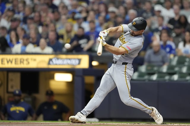 MILWAUKEE, WISCONSIN - JUNE 24: Bryan Reynolds #10 of the Pittsburgh Pirates hits a double against the Milwaukee Brewers during the first inning at American Family Field on June 24, 2025 in Milwaukee, Wisconsin.