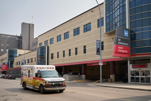 An ambulance drives past Health Sciences Centre in Winnipeg on Thursday, June 15, 2023. 