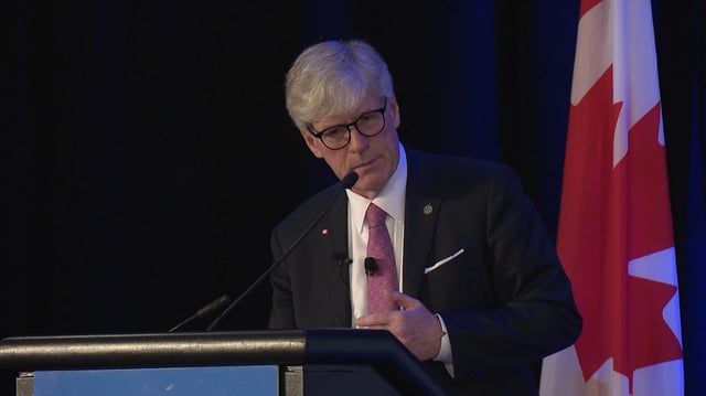 A file photo of Natural Resources Minister Tim Hodgson speaking in Calgary in May 2025.