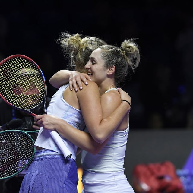 New Zealand's Erin Routliffe, left, and Canada's Gabriela Dabrowski hug each other after winning the women's doubles final match of the WTA finals against Taylor Townsend of the U.S. and Katerina Siniakova of the Czech Republic, at King Saud University Indoor Arena, in Riyadh, Saudi Arabia, Saturday, Nov. 9, 2024. (AP Photo)<