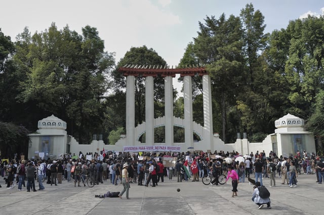 People protest against gentrification at Parque Mexico in Mexico City, Friday, July 4, 2025. (AP Photo/Jon Orbach)