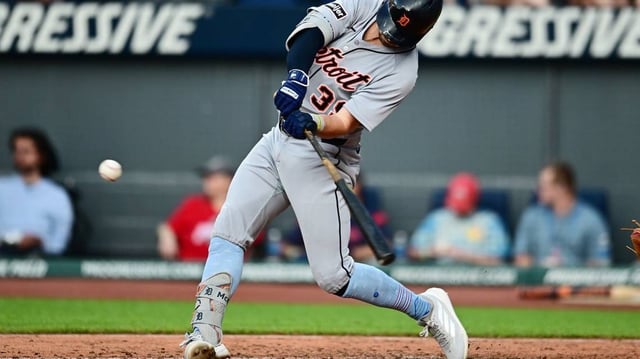 Jul 4, 2025; Cleveland, Ohio, USA; Detroit Tigers shortstop Zach McKinstry (39) hits a home run during the fourth inning against the Cleveland Guardians at Progressive Field. Mandatory Credit: Ken Blaze-Imagn Images