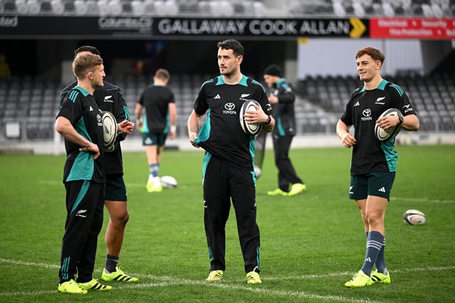 Damian McKenzie, Will Jordan and Ruben Love look on during a New Zealand All Blacks captains run at Forsyth Barr Stadium on July 04, 2025 in Dunedin, New Zealand.
