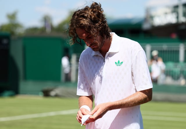 Tennis - Wimbledon - All England Lawn Tennis and Croquet Club, London, Britain - June 30, 2025 Greece's Stefanos Tsitsipas looks dejected after losing his first round match by walkover against France's Valentin Royer REUTERS/Isabel Infantes/File Photo