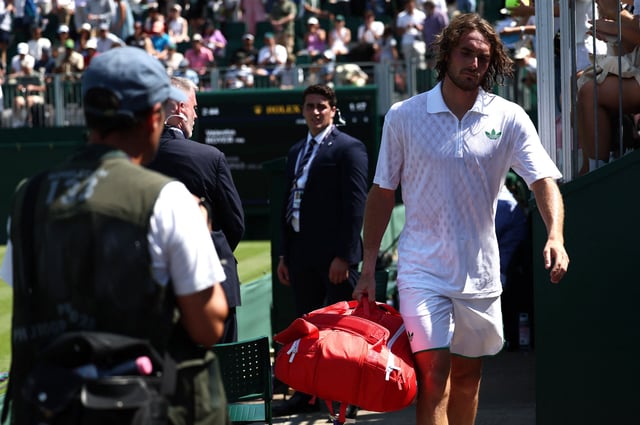 Tennis - Wimbledon - All England Lawn Tennis and Croquet Club, London, Britain - June 30, 2025 Greece's Stefanos Tsitsipas looks dejected after losing his first round match by walkover against France's Valentin Royer REUTERS/Isabel Infantes/File Photo