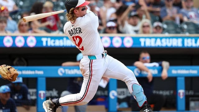 Jul 4, 2025; Minneapolis, Minnesota, USA; Minnesota Twins left fielder Harrison Bader (12) hits a solo walk-off home run against the Tampa Bay Rays during the ninth inning at Target Field. Mandatory Credit: Matt Krohn-Imagn Images