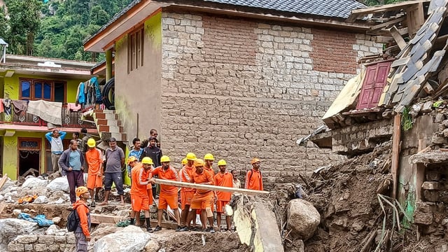 Relief and rescue operation underway after flash floods at Thunag, in Mandi district, Himachal Pradesh.