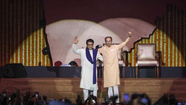 MNS chief Raj Thackeray (left) and Shiv Sena (UBT) chief Uddhav Thackeray during a joint victory rally at Worli, in Mumbai, on Saturday. (PTI)
