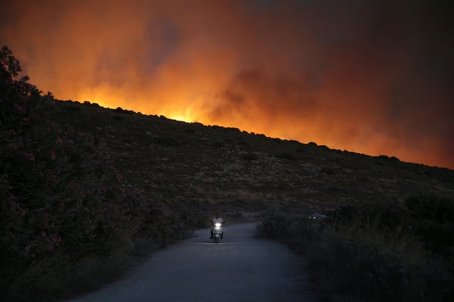 After an intense night fighting the blaze in the western area of Cesme, the fire was brought under control, a minister said