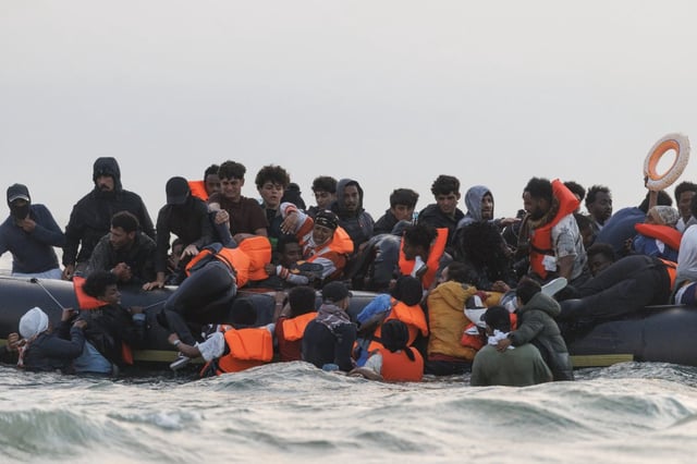 Families and children board a small boat in Gravelines, France (Photo: Dan Kitwood/Getty)