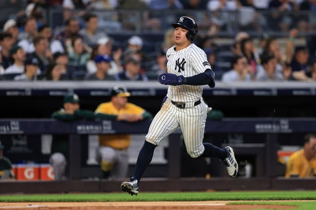 NEW YORK, NEW YORK - JUNE 27: Anthony Volpe #11 of the New York Yankees scores a run during the third inning of the game against the Athletics at Yankee Stadium on June 27, 2025 in New York City. (Photo by Dustin Satloff/Getty Images)