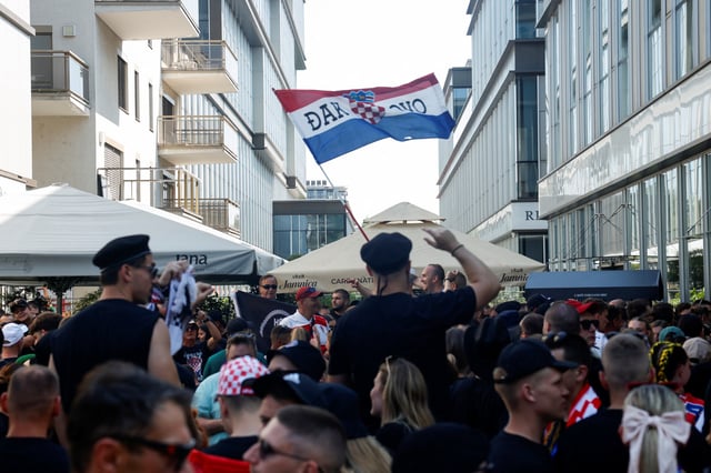 People gather ahead of the concert of the Croatian singer Marko Perkovic Thompson, which is poised to break the world record for largest paid concert in Zagreb, Croatia, July 5, 2025. REUTERS/Borut Zivulovic