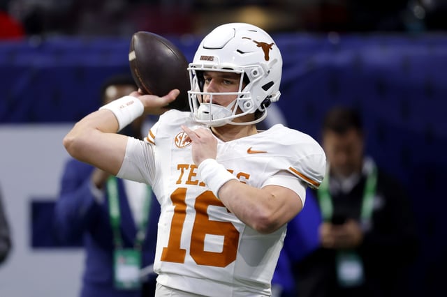 Arch Manning #16 of the Texas Longhorns warms up prior to the 2024 SEC Championship against the Georgia Bulldogs at Mercedes-Benz Stadium on December 07, 2024 in Atlanta, Georgia.
