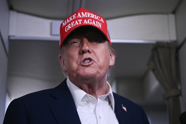 President Donald Trump speaking to journalists aboard Air Force One after departing Joint Base Andrews, Maryland on his way to Bedminster, New Jersey on July 4, 2025.