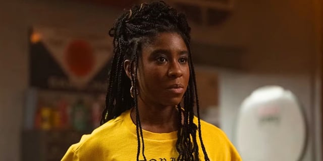 Lyric Ross as N.A.T.A.L.I.E. looking serious in Ironheart.