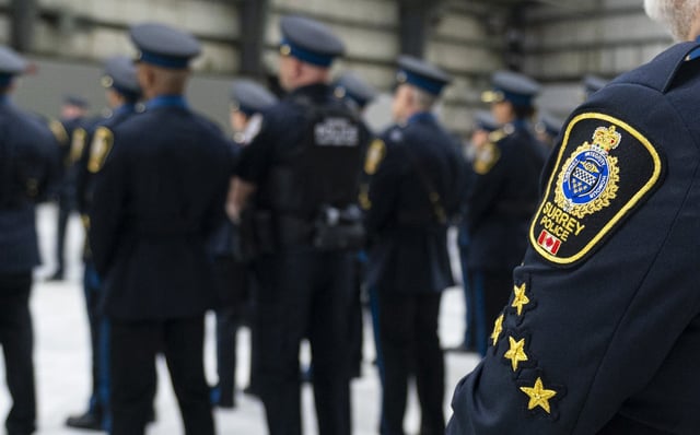 A shoulder patch for the Surrey police service is seen during a ceremony in Surrey, B.C., Tuesday, April 22, 2025.  THE CANADIAN PRESS/Rich Lam