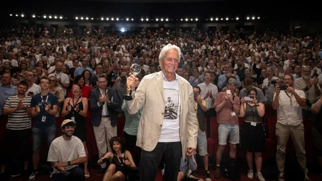 US actor and film producer Michael Douglas poses with an honorary award on the occasion of the screening of a newly restored version of the film 'One Flew Over the Cuckoo's Nest' at the 59th Karlovy Vary International Film Festival (KVIFF) in Karlovy Vary, Czech Republic on July 5, 2025 (MICHAL CIZEK/AFP via Getty Images)