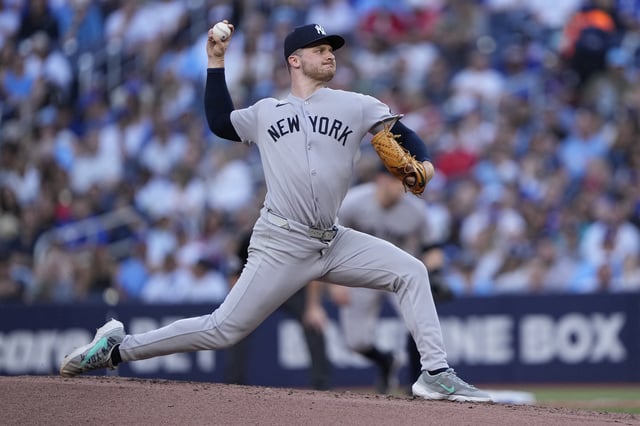 Jul 3, 2025; Toronto, Ontario, CAN; New York Yankees starting pitcher Clarke Schmidt (36) pitches to the Toronto Blue Jays during the second inning at Rogers Centre. Mandatory Credit: John E. Sokolowski-Imagn Images/File Photo