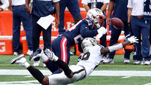Sep 27, 2020; Foxborough, Massachusetts, USA; New England Patriots cornerback Stephon Gilmore (24) breaks up a pass intended for Las Vegas Raiders wide receiver Bryan Edwards (89) during the first quarter at Gillette Stadium. Mandatory Credit: Brian Fluharty-Imagn Images