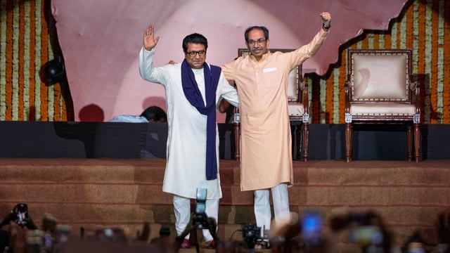 Maharashtra Navnirman Sena (MNS) chief Raj Thackeray, left, and Shiv Sena (UBT) chief Uddhav Thackeray during a joint victory rally, titled 'Awaj Marathicha', organised by the cousins, at Worli area, in Mumbai, Maharashtra, Saturday, July 5, 2025.