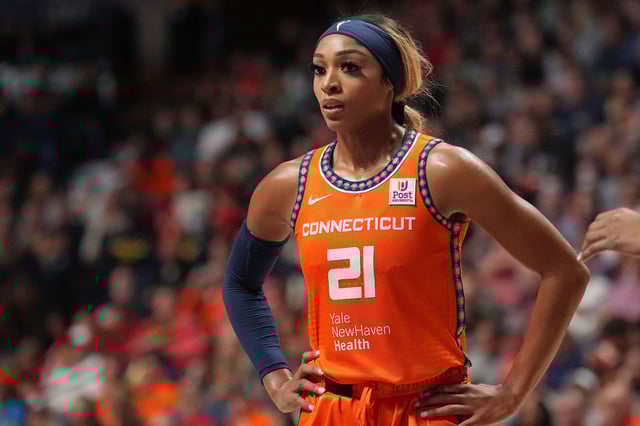 DiJonai Carrington #21 of the Connecticut Sun looks on during the game against the Indiana Fever in the 2024 WNBA Playoffs on September 22, 2024.