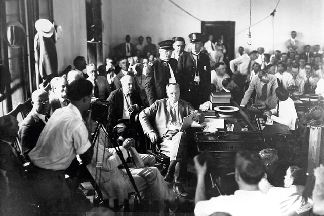Judge John T. Raulston holds the decision in the Scopes Trial at the Rhea County Courthouse in Dayton, Tennessee, July 17, 1925. John Scopes, a biology
teacher, was on trial for violating a Tennessee law that forbade the teaching of evolution in public schools because it contradicted the Bible.