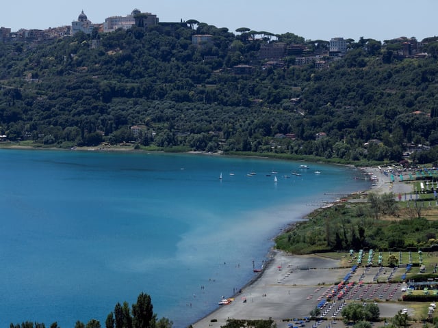 A general view of the town of Castel Gandolfo overlooking Lake Albano, near Rome, where Pope Leo will spend two weeks of vacation in July, Italy, July 1, 2025. REUTERS/Remo Casilli