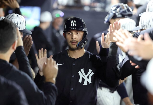 Mar 3, 2025; Tampa, Florida, USA;  New York Yankees catcher Alex Jackson (39) is congratulated after he scored a run during the second inning against the Pittsburgh Pirates at George M. Steinbrenner Field. Mandatory Credit: Kim Klement Neitzel-Imagn Images/File Photo