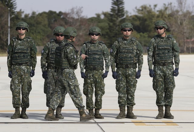 Taiwanese soldiers stand by for a drill of the MIM-104 Patriot short-range anti-aircraft missile system at an air base in Taichung City, central Taiwan, Wednesday, Jan. 8, 2025.