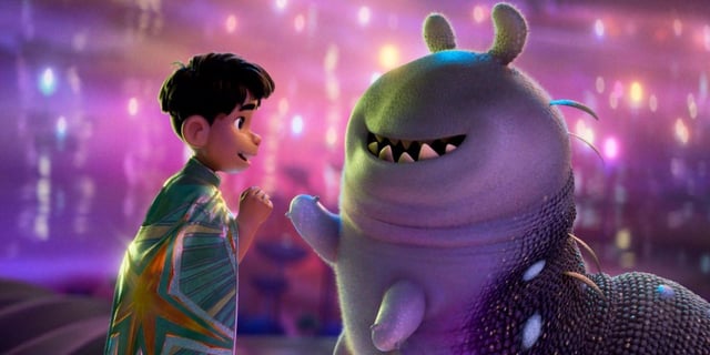 Elio (Yonas Kibreab) fist-bumping Glordon (Remy Edgerly) in 'Elio.'