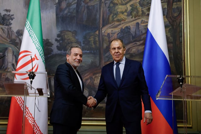 Russia's Foreign Minister Sergei Lavrov and Iran's Foreign Minister Abbas Araqchi shake hands during a press conference following their talks in Moscow, Russia, April 18, 2025. Tatyana Makeyeva/Pool via REUTERS/File Photo