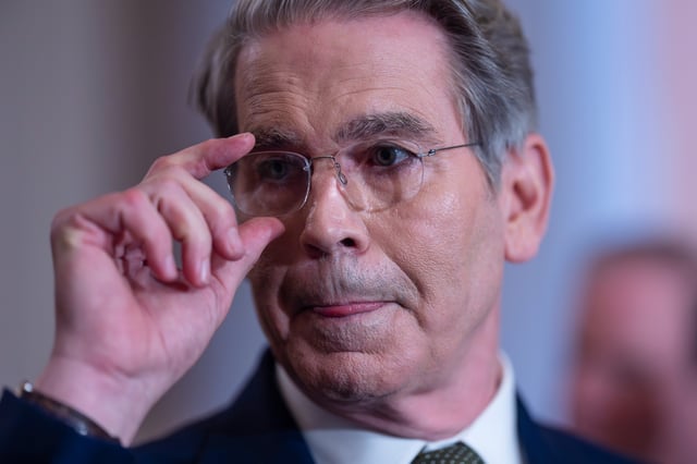 Treasury Secretary Scott Bessent talks to reporters about his lunch meeting with Republican senators and the schedule for getting the Republican megabill to President Donald Trump's desk by July 4, at the Capitol in Washington, Tuesday, June 24, 2025. 