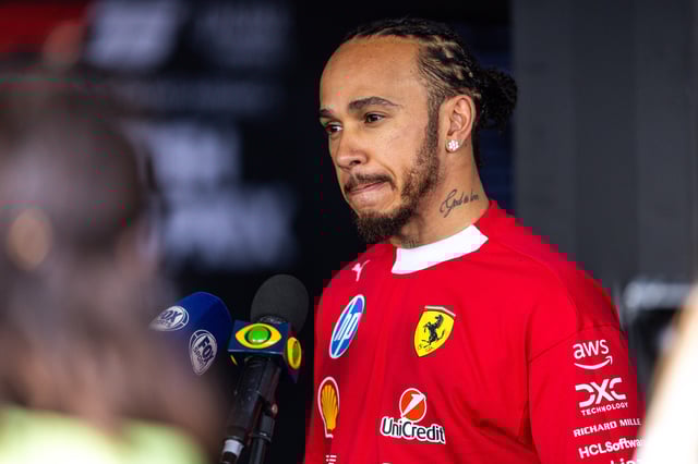 Lewis Hamilton of Great Britain and Ferrari answers questions in the TV media pen during the F1 Grand Prix of Great Britain at Silverstone Circuit on July 6, 2025 in Northampton, United Kingdom.