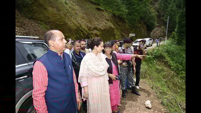 Himachal MP Kangana Ranaut and leader of Opposition Jai Ram Thakur during a visit in flood-hit area of Mandi district on Sunday. (Source)