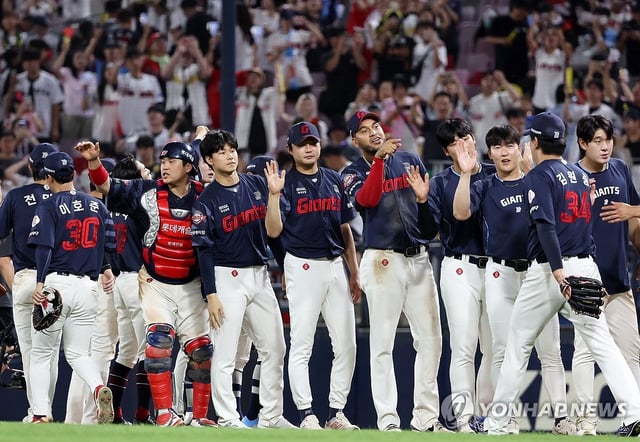 Lotte Giants players celebrate their 5-2 victory over the Kia Tigers in their Korea Baseball Organization regular-season game at Gwangju-Kia Champions Field in Gwangju, 270 kilometers south of Seoul, on July 6, 2025. (Yonhap)