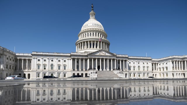 The U.S. Capitol reflects in the Capitol Visitor Centers skylight on the East Plaza. 