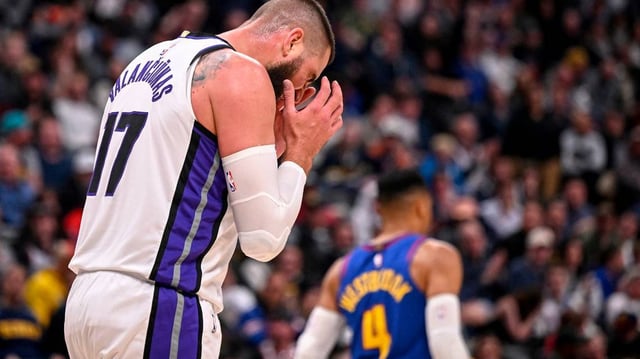 Jonas Valanciunas (17) of the Sacramento Kings reacts to missing a pass from DeMar DeRozan (10) during the third quarter against the Denver Nuggets at Ball Arena in Denver on Wednesday, March 5, 2025. (AAron Ontiveroz/The Denver Post/TNS)