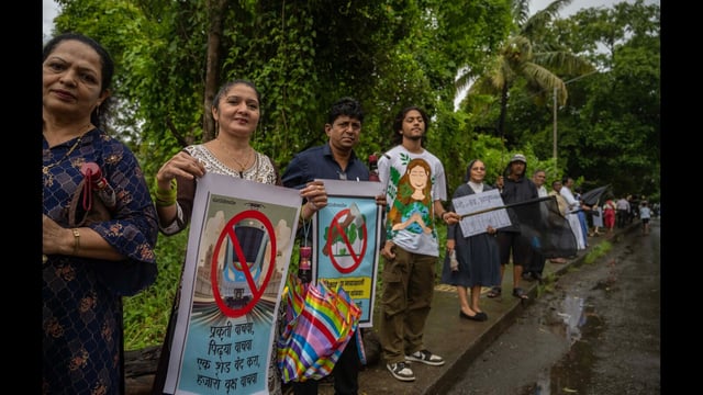 Mumbai, India - July 06, 2025: A human chain protest was organised at Dongri in Bhayandar against the proposed Metro car shed depot project being undertaken by MMRDA on a natural hill. The project threatens to cut down over 12,400 trees, and the tree-cutting activity has already begun. Protesters demand an immediate halt to the deforestation in Mumbai, India, on Sunday, July 06, 2025. (Photo by Satish Bate/ Hindustan Times) (Hindustan Times)