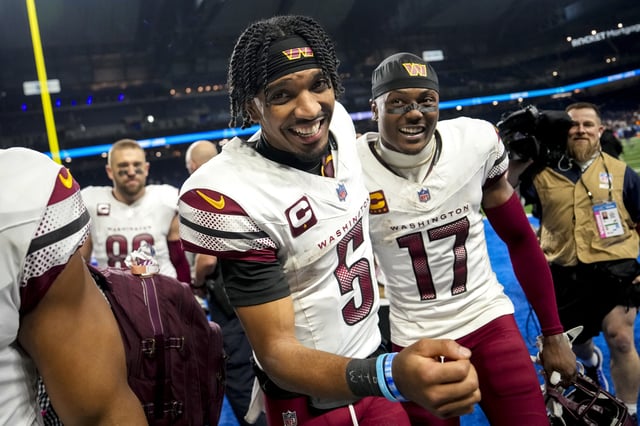 Jayden Daniels #5 of the Washington Commanders celebrates with Terry McLaurin #17 after defeating the Detroit Lions 45-31 in the NFC Divisional Playoff at Ford Field on January 18, 2025 in Detroit, Michigan.