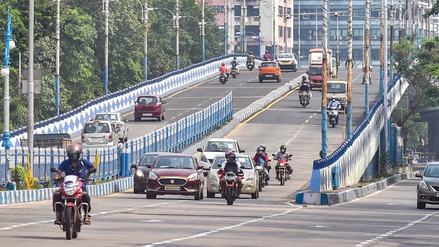 Vehicles on a flyover after easing of restrictions of Covid-19 lockdown, in Kolkata on Tuesday.