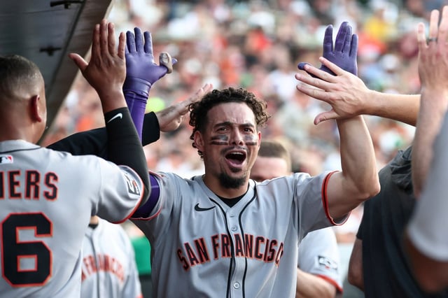 San Francisco Giants’ Willy Adames celebrates in the dugout after hitting a solo home run during the fourth inning of a baseball game against the Athletics, Sunday, July 6, 2025, in West Sacramento, Calif. (AP Photo/Sara Nevis)